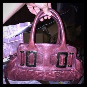 Purple Italian leather purse by Dissona